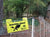 Gallagher Electric Fence Warning Sign on chicken netting